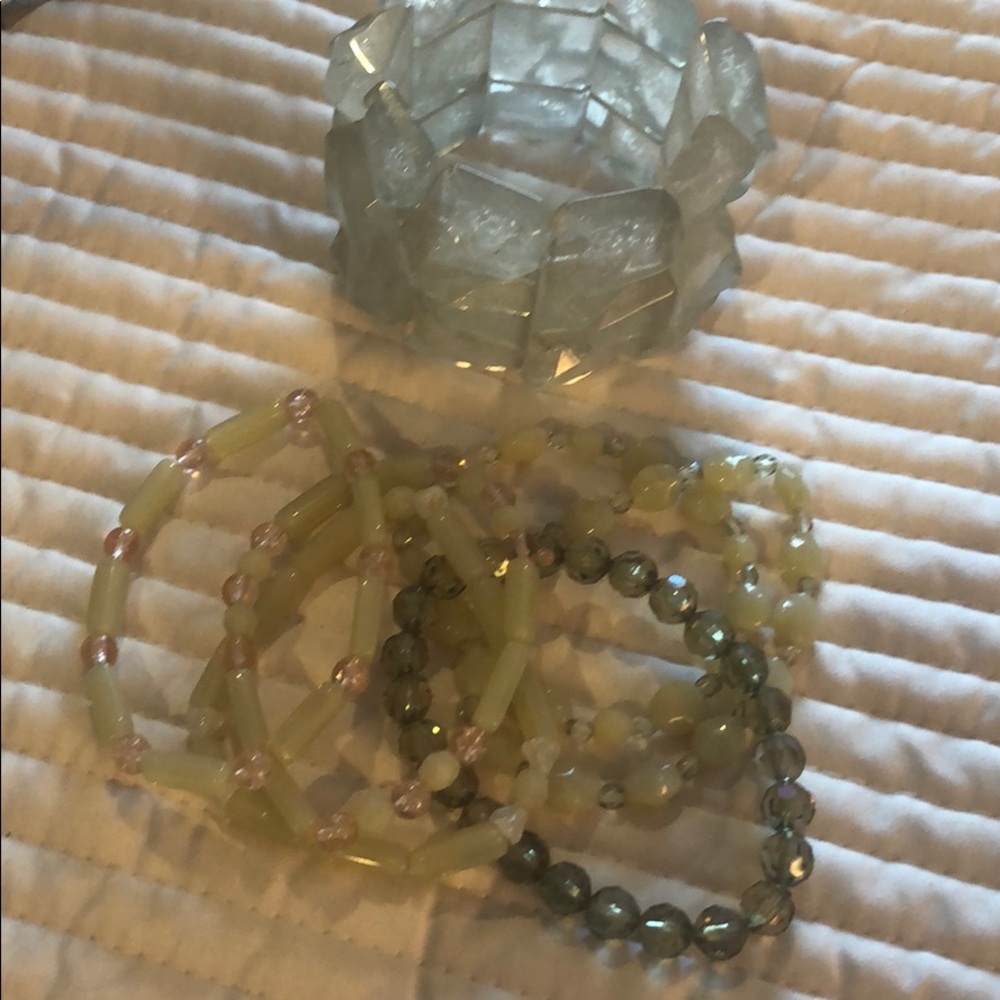 Collection of pale green bracelets